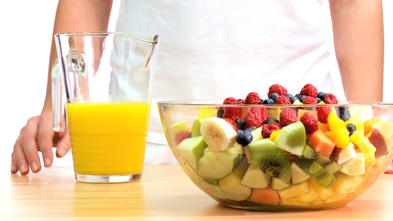 fresh-orange-juice-being-poured-over-a-bowl-of-healthy-mixed-fruit-salad_v1no0ihyg__F0000 (2)